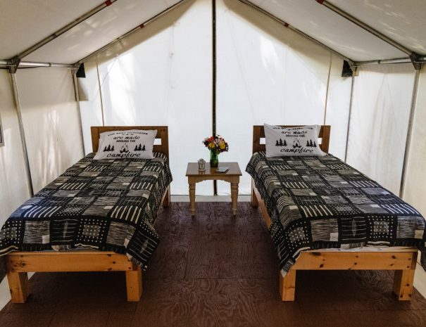 Twin beds set up in the Quarry Tent at Irvineside Farm.